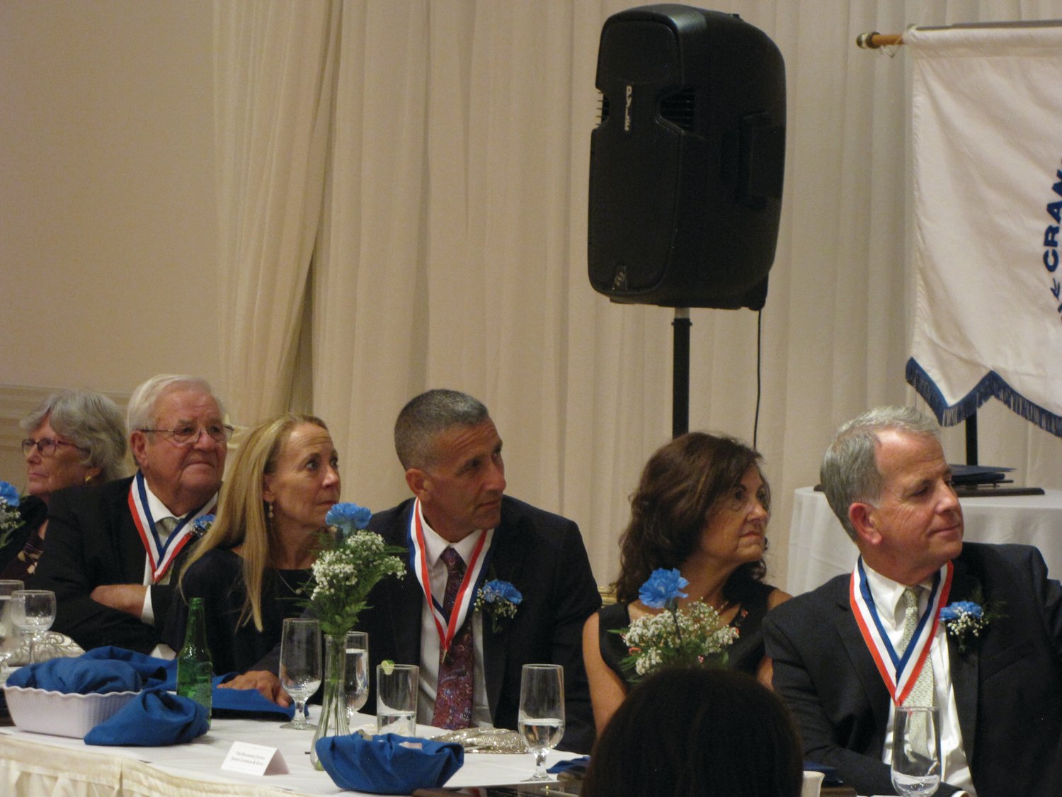 HEAD TABLE: From left, Carol and William Stamp, Diana and John Macera, and Kathleen and Jeffrey Lanphear look on during Anthony Tomaselli’s Hall of Fame induction speech.